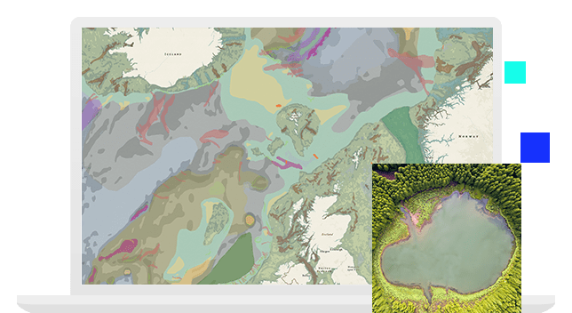 Laptop monitor showing a multicolored topographic map with hilly terrain and a small aerial image of a lake