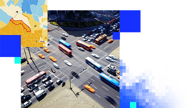 A busy intersection with blurry cars and busses passing through overlaid with a map with different regions divided in orange, yellow, and blues