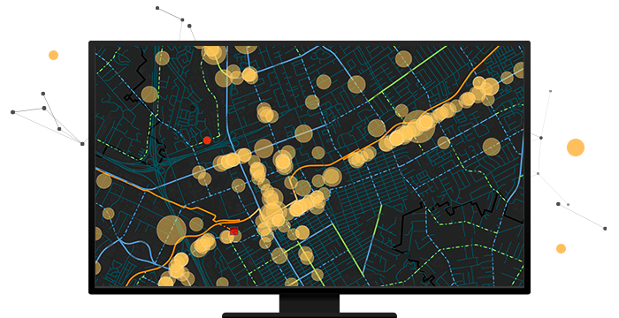 A computer monitor showing a black digital map with scattered yellow data points