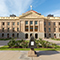 The Arizona Capitol Museum, a historic building in white and off-white brick with a row of columns across the front