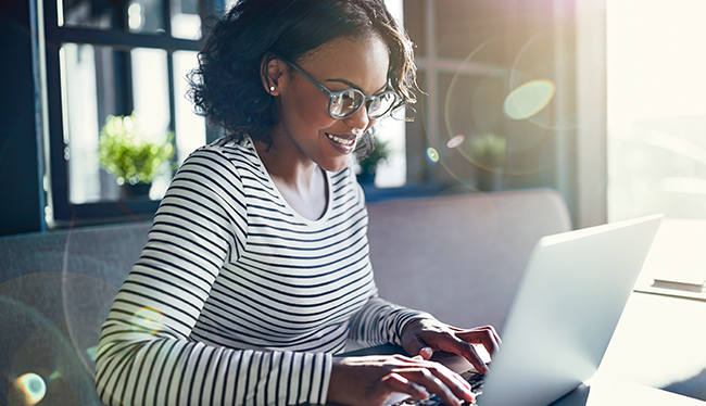 Woman looking at a laptop