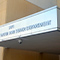 The front entrance to the WASD office in warm dun stucco and metal accents