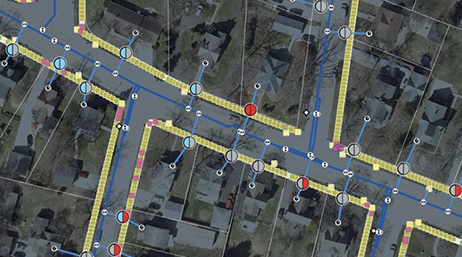 A utility service map displaying lines of service and the residences they serve in a suburban neighborhood