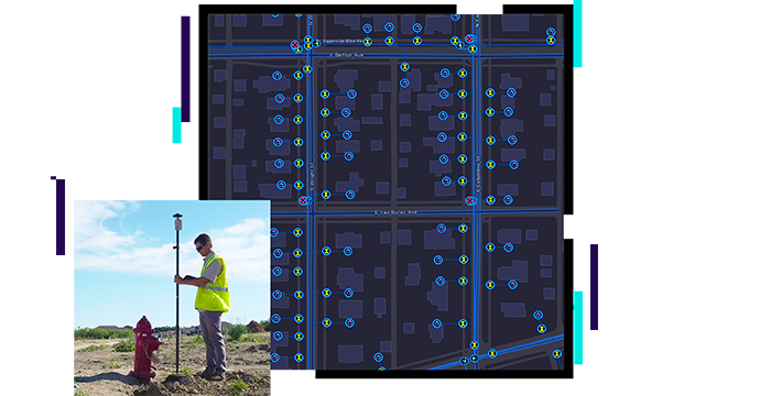 Person in a yellow safety vest next to a fire hydrant and a map of water infrastructure