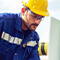 A pipeline operator checking green pipes