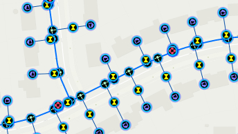 Water distribution network with hydrants, valves, meters, and pipes. 